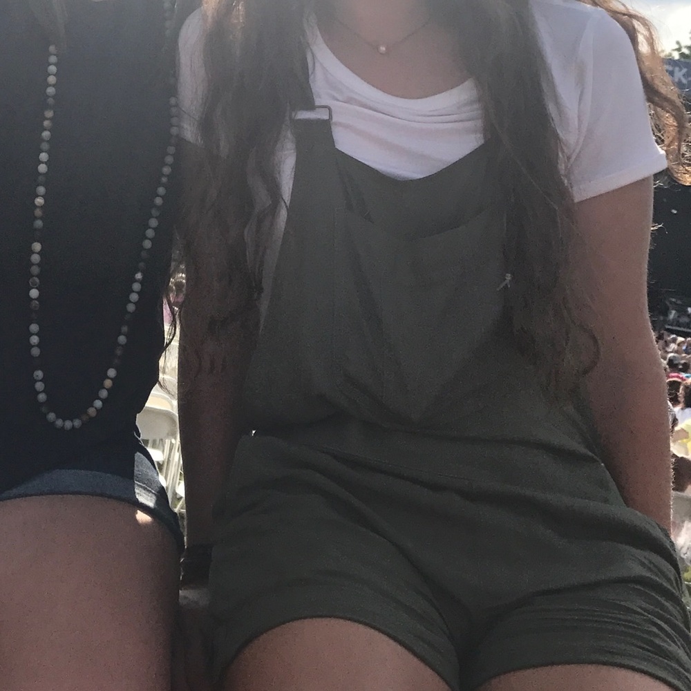 Green overall shorts romper.